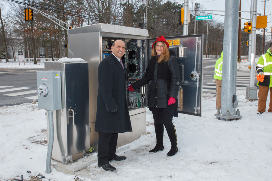 Freeholders Arnone and DiMaso activate new traffic light at Asbury Ave. and Fox Chase Dr. in Tinton Falls. 